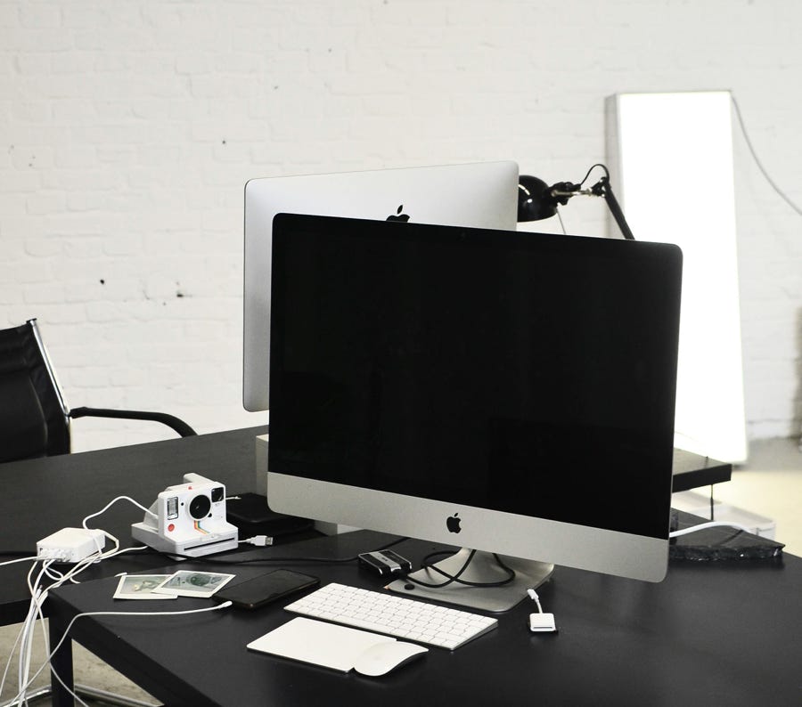 Modern convenient computer place on black table in office